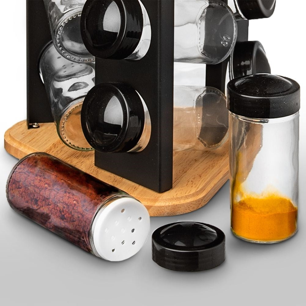 Glass container for spices with black plastic cap
