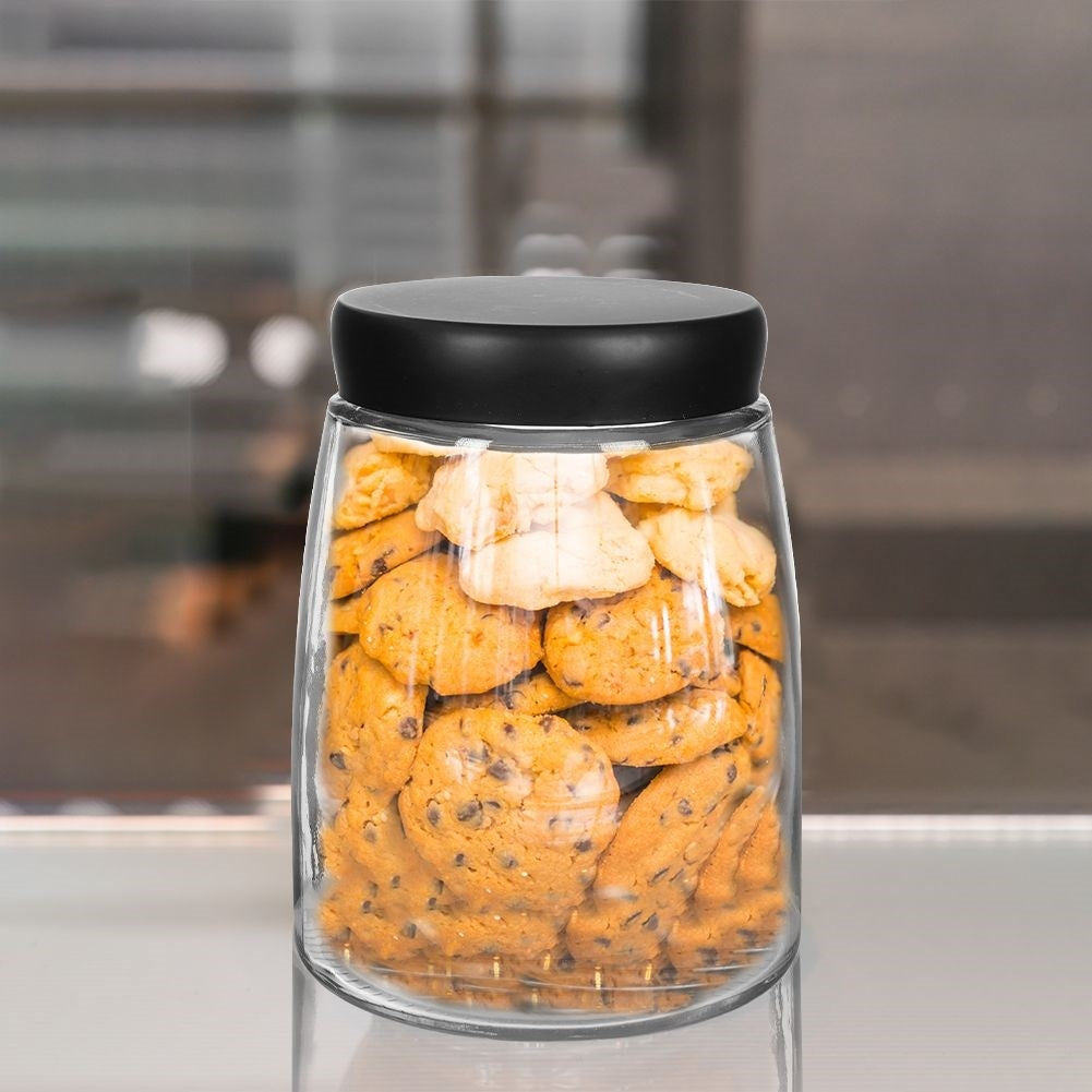Glass container with black lid for food storage