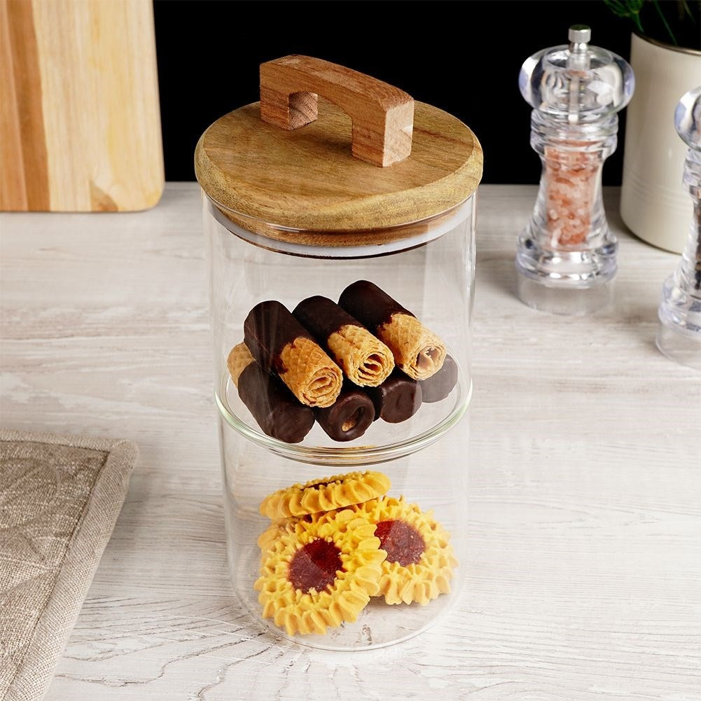 Glass container with wooden lid and silicone seal for food storage