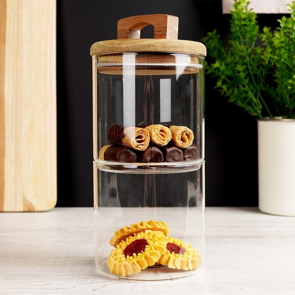 Glass container with wooden lid and silicone seal for food storage