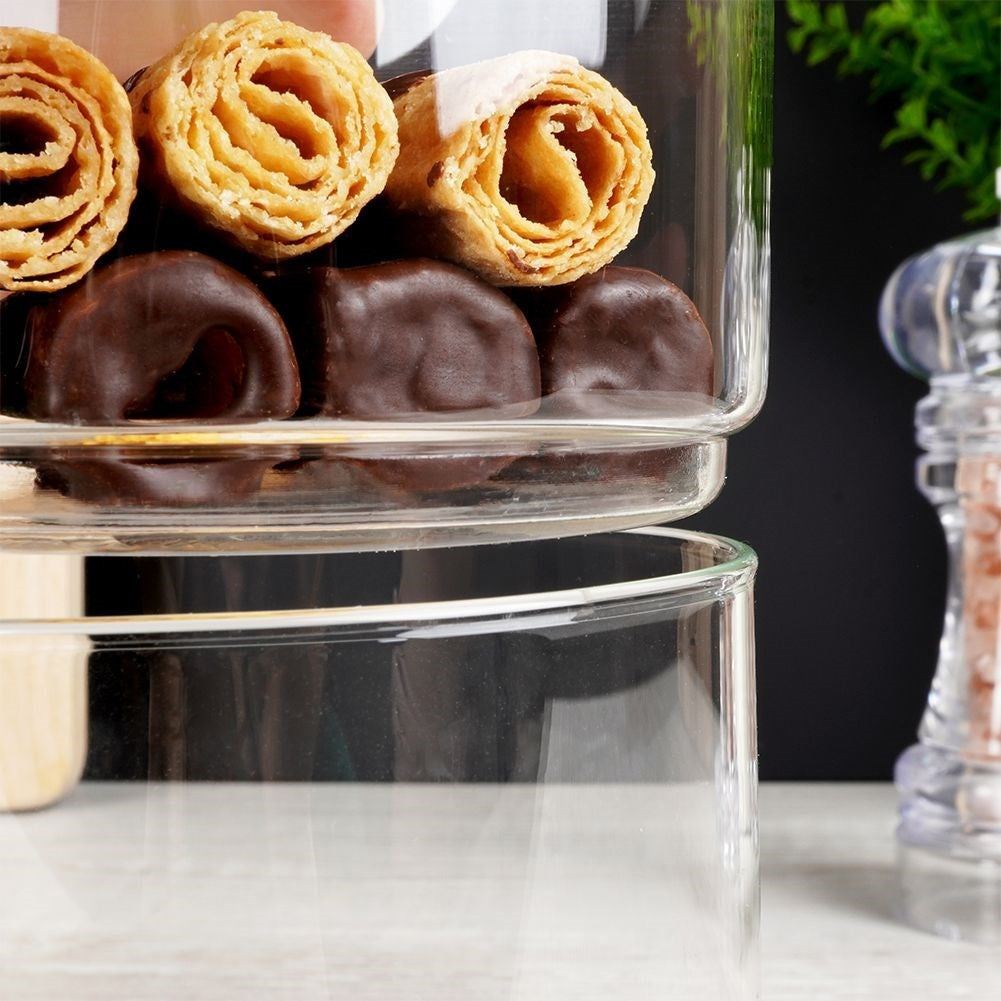 Glass container with wooden lid and silicone seal for food storage