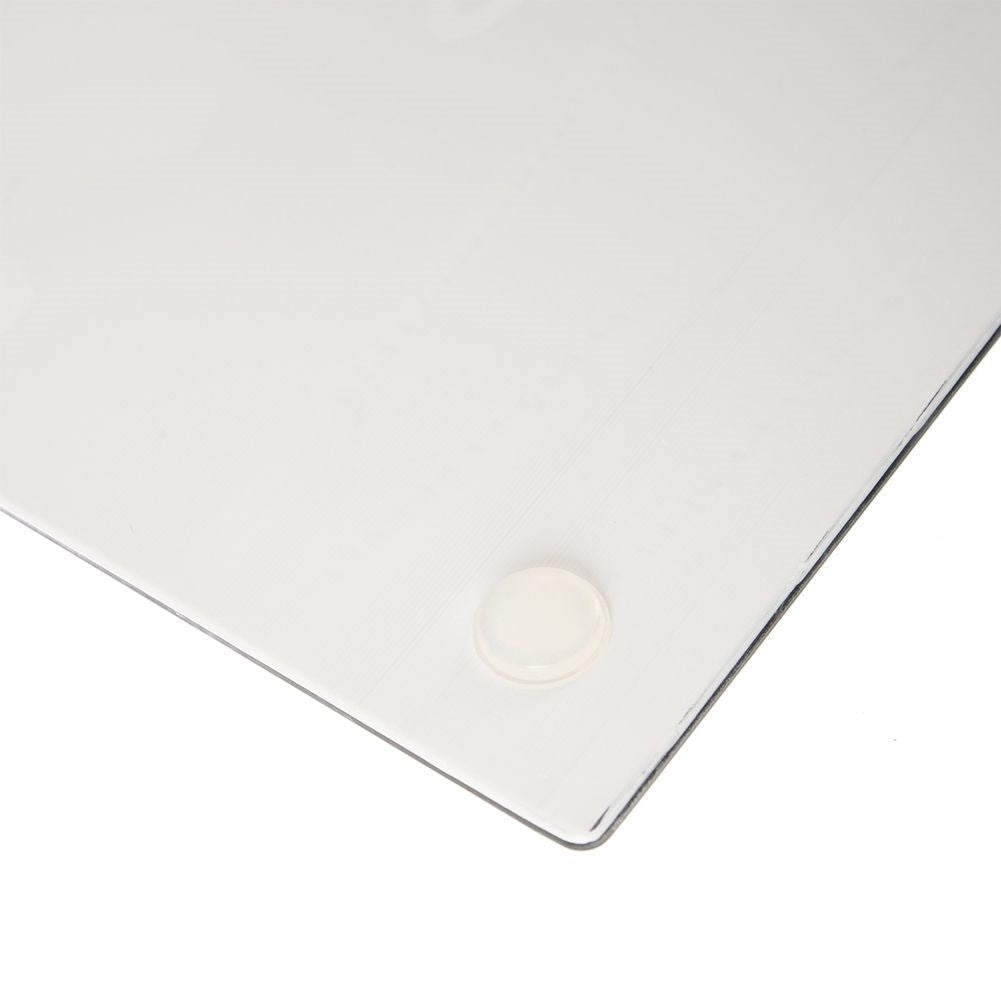 Glass cutting board with colorful clown motif and non-slip feet