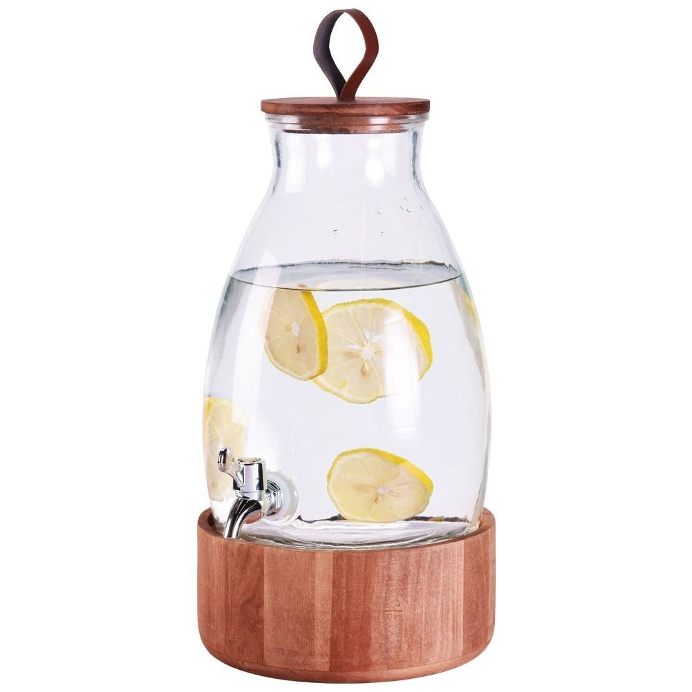Glass jar with tap and wooden stand for drinks