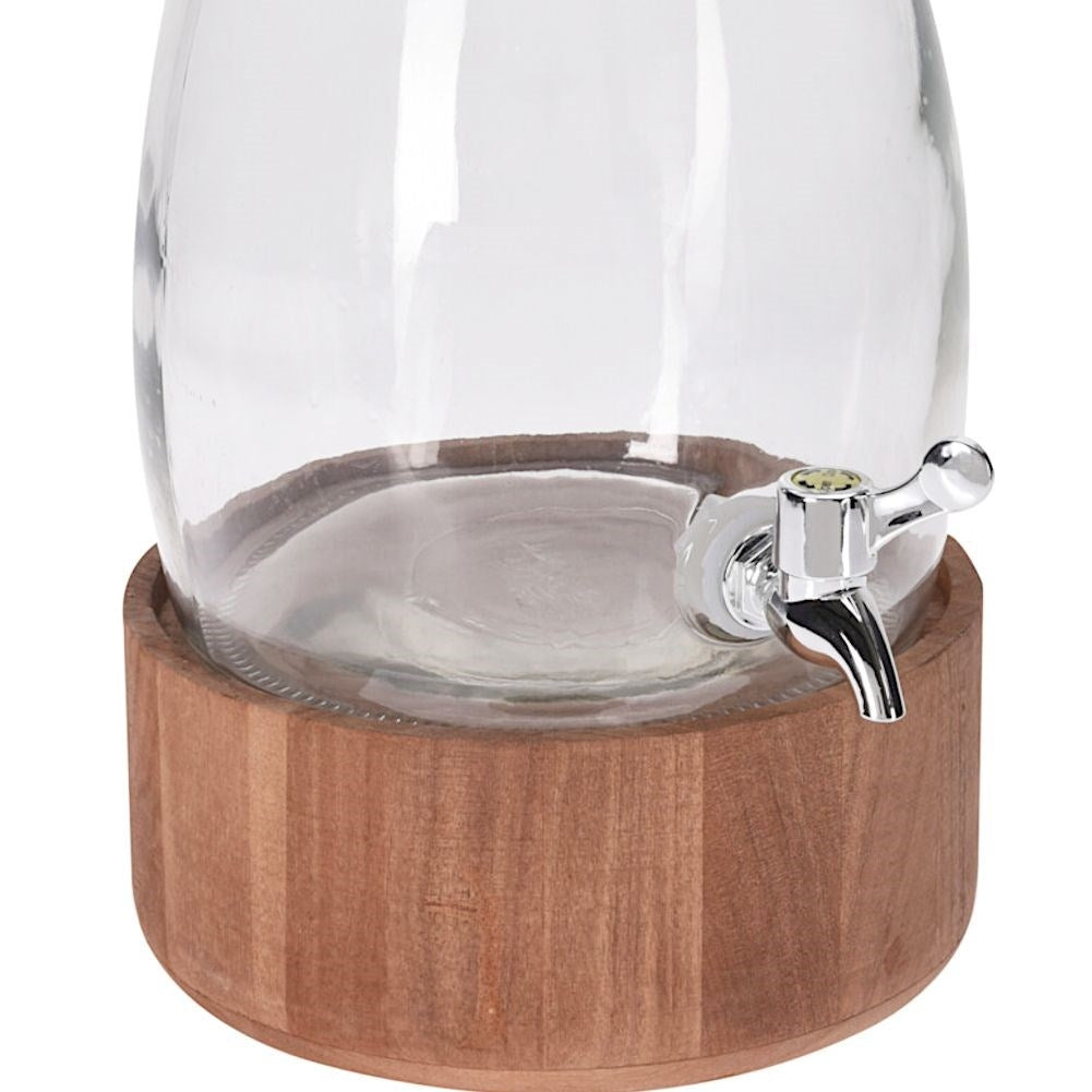 Glass jar with tap and wooden stand for drinks