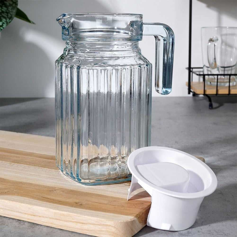 Glass jug with lid for drinks - water, juice, iced tea