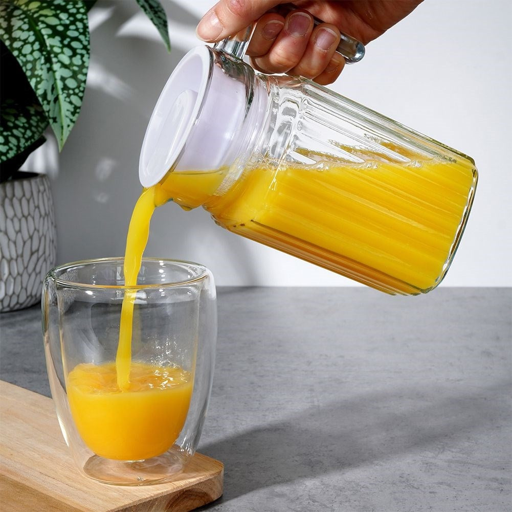Glass jug with lid for drinks - water, juice, iced tea