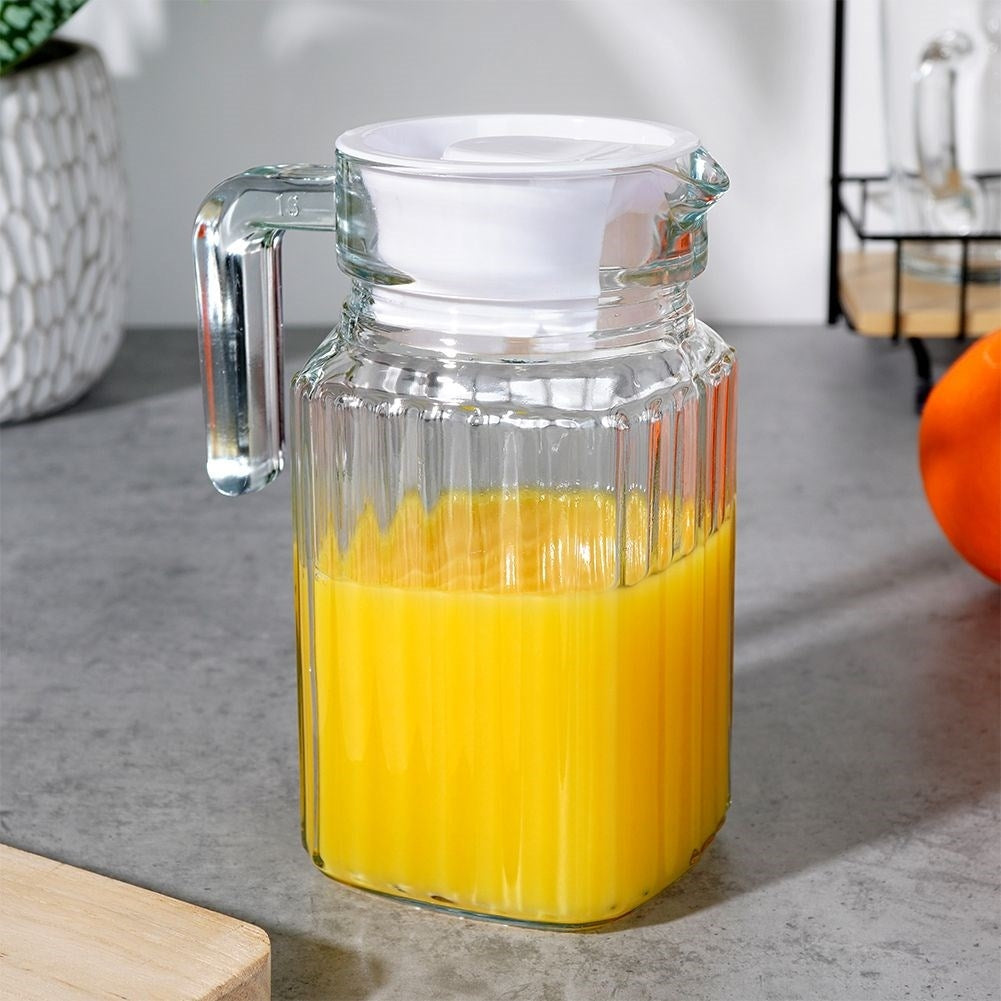 Glass jug with lid for drinks - water, juice, iced tea