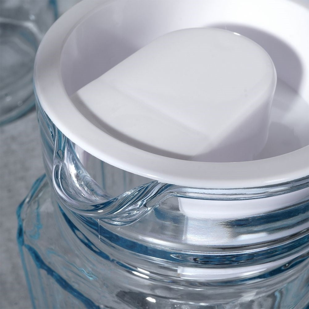 Glass jug with lid for drinks - water, juice, iced tea