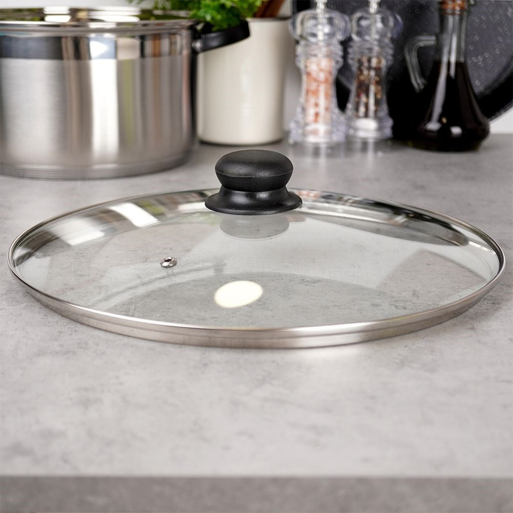 Glass lid with stainless edge and steam valve