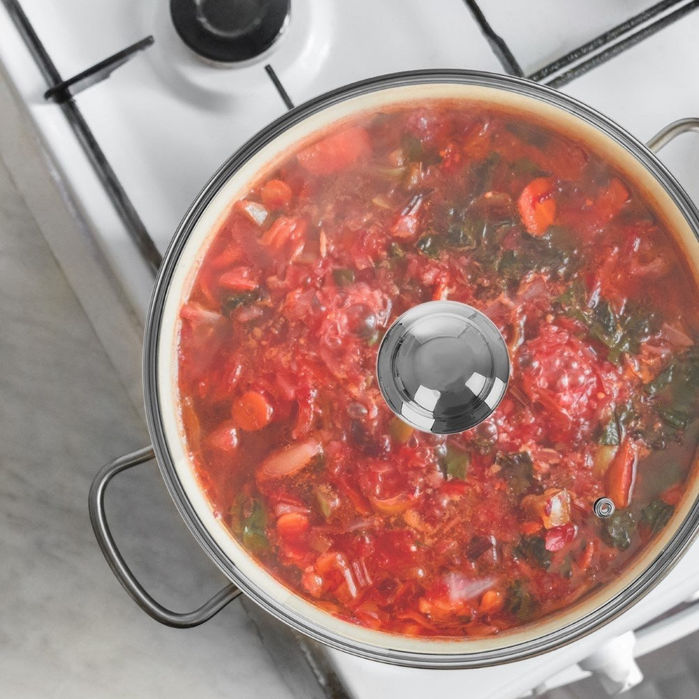 Glass lid with steel edge and steam opening for pots and pans