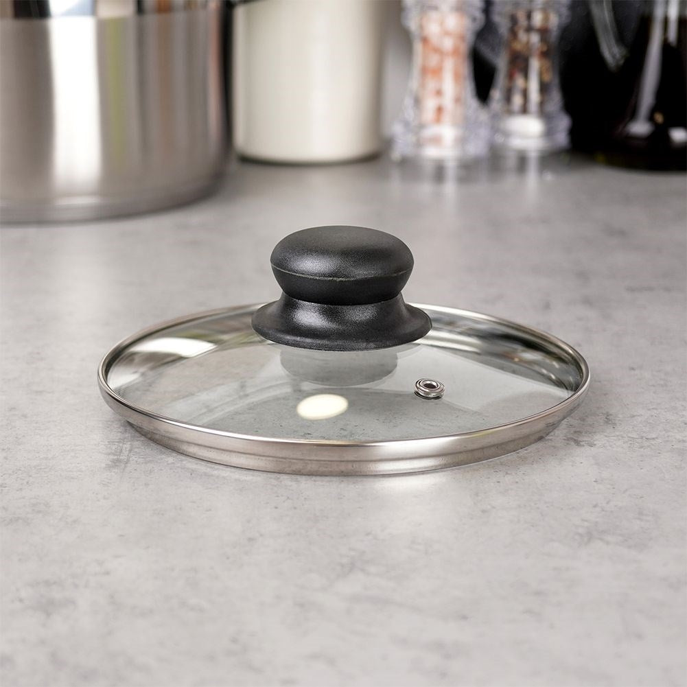 Glass lid with steel edge, plastic handle and steam outlet