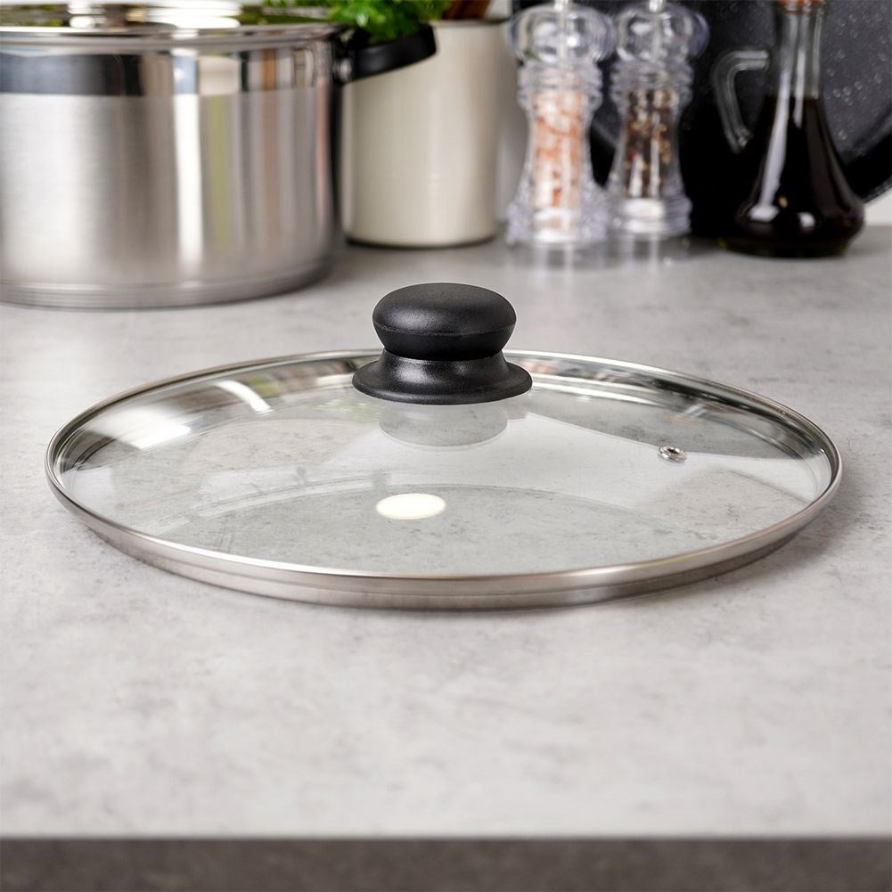 Glass lid with steel rim and steam vent, plastic comfortable handle