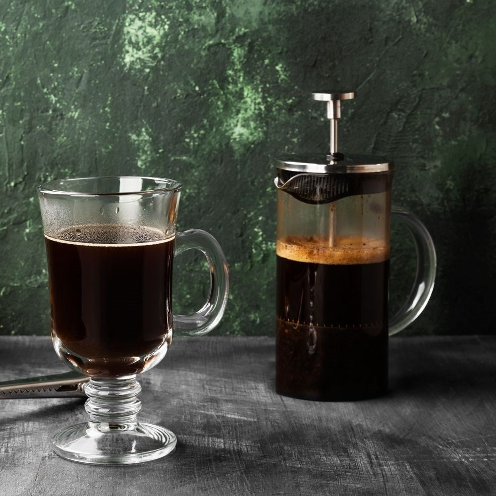 Glass maker with jug and strainer for coffee, tea and skimmed milk