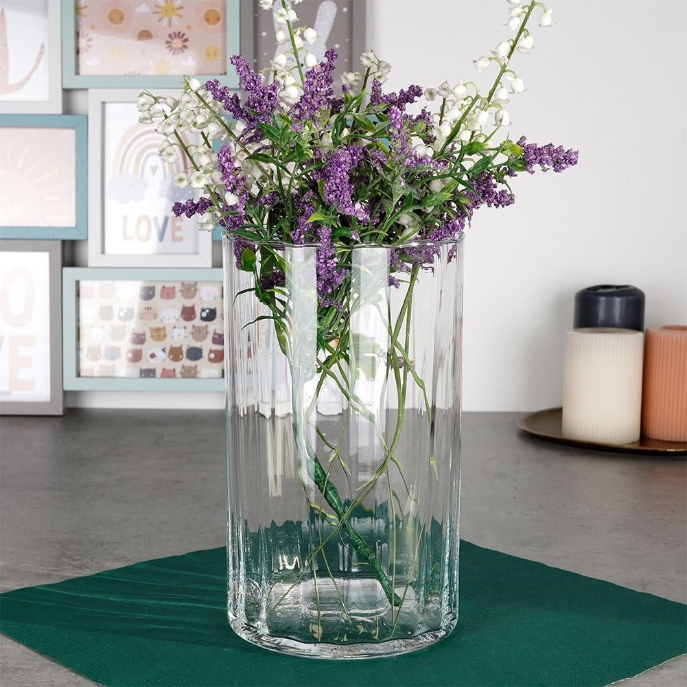 Glass vase with vertical stripes for flowers and decoration