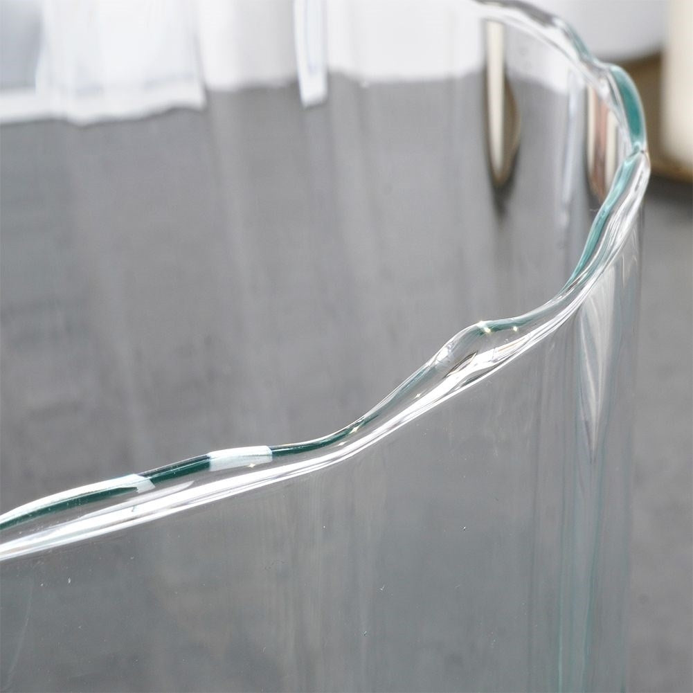 Glass vase with vertical stripes for flowers and decoration