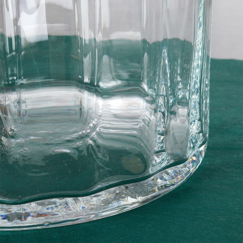 Glass vase with vertical stripes for flowers and decoration