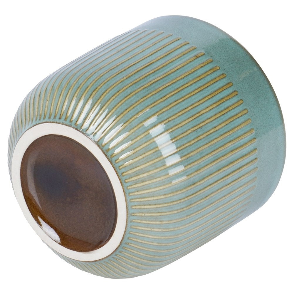 Glazed green porcelain pot with ribbed surface and subtle shine