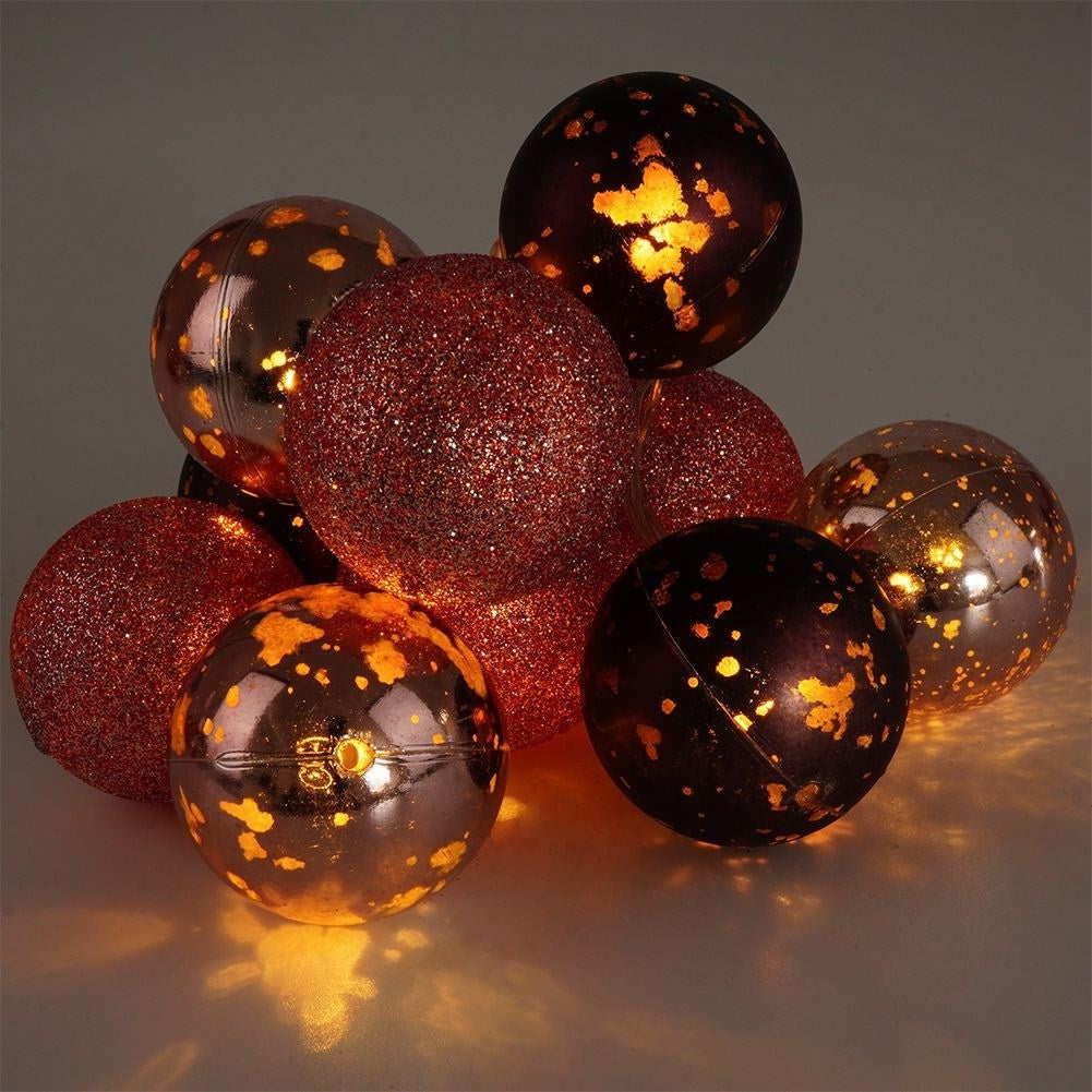 Glowing purple Christmas balls: matte, glittery, shiny, LED, indoor