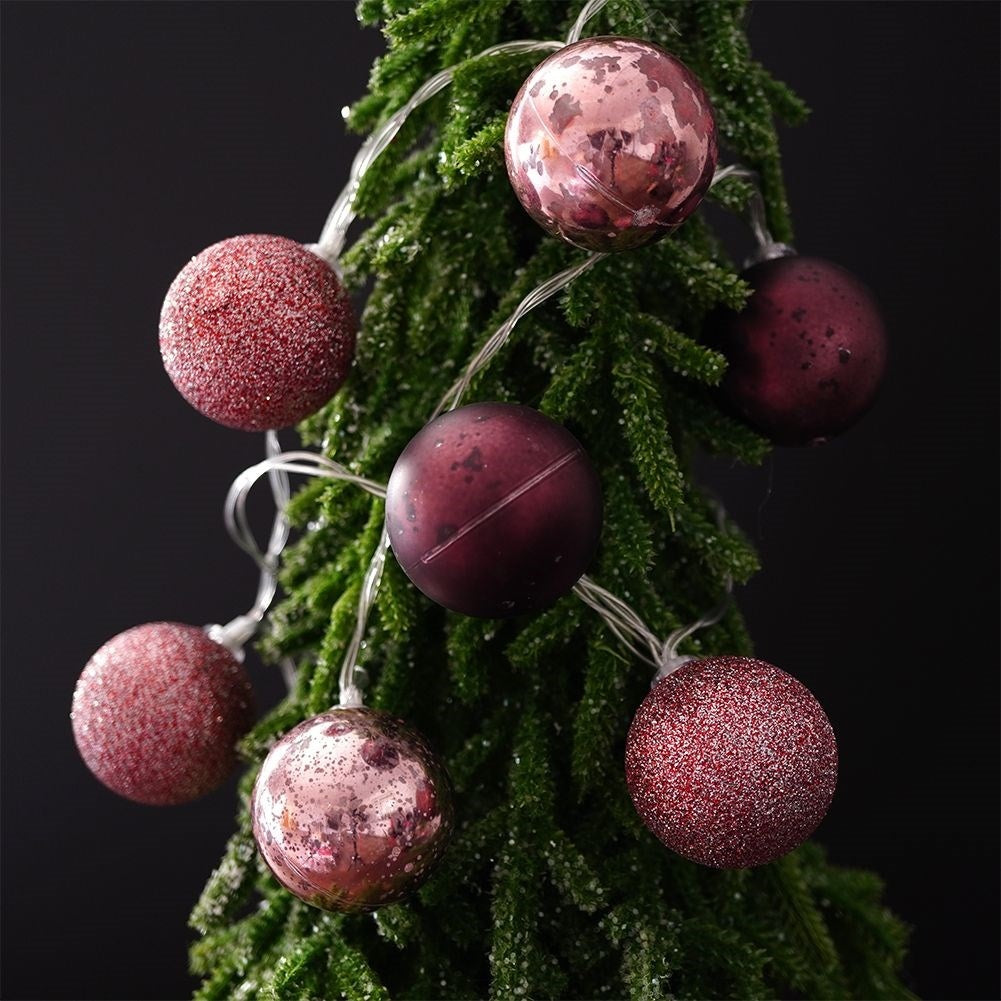Glowing purple Christmas balls: matte, glittery, shiny, LED, indoor
