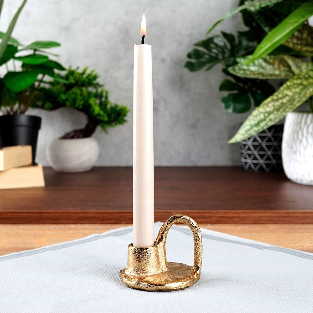 Gold colored aluminum candle holder with handle