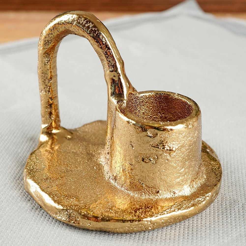 Gold colored aluminum candle holder with handle