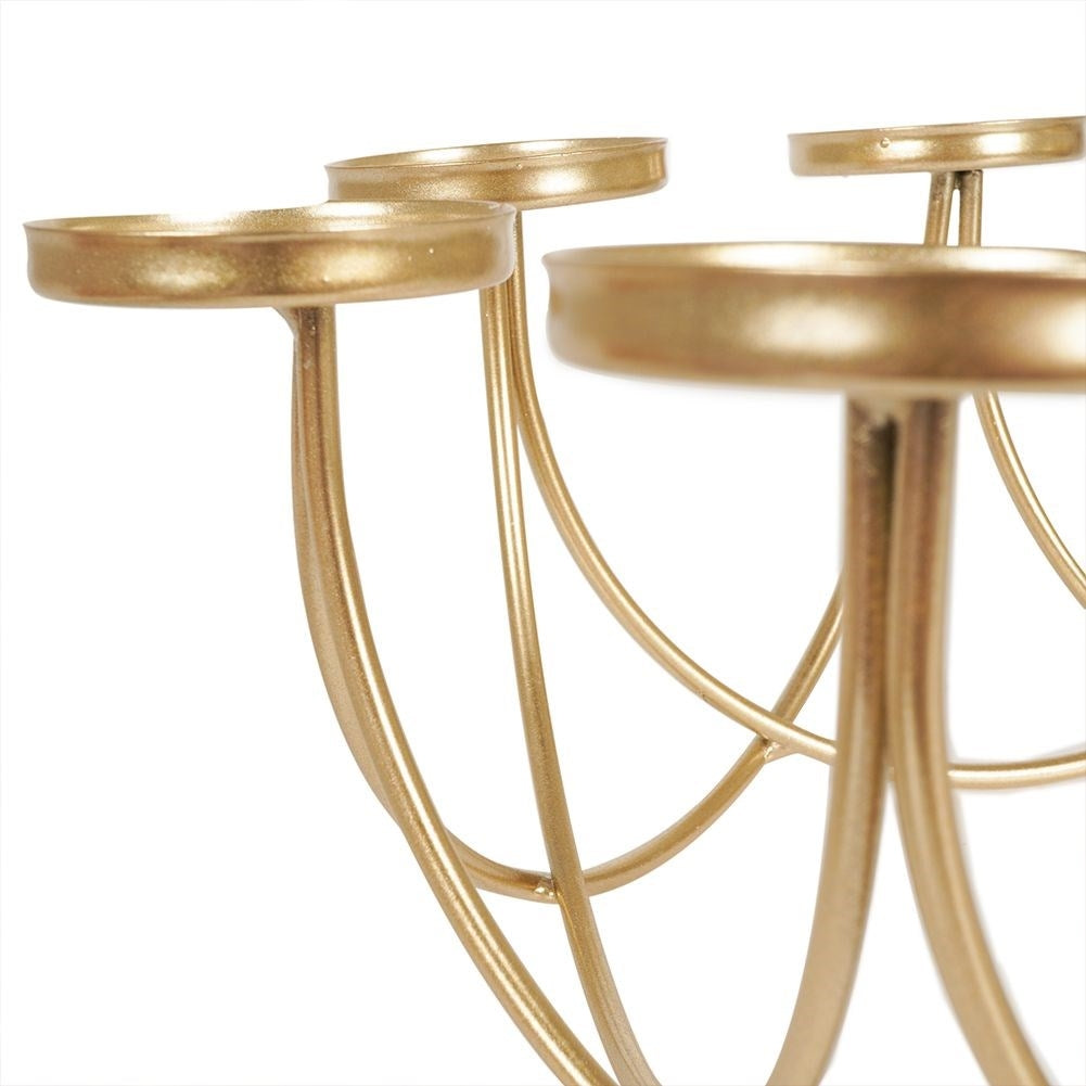 Gold-colored metal candlestick for 8 candles in a circle