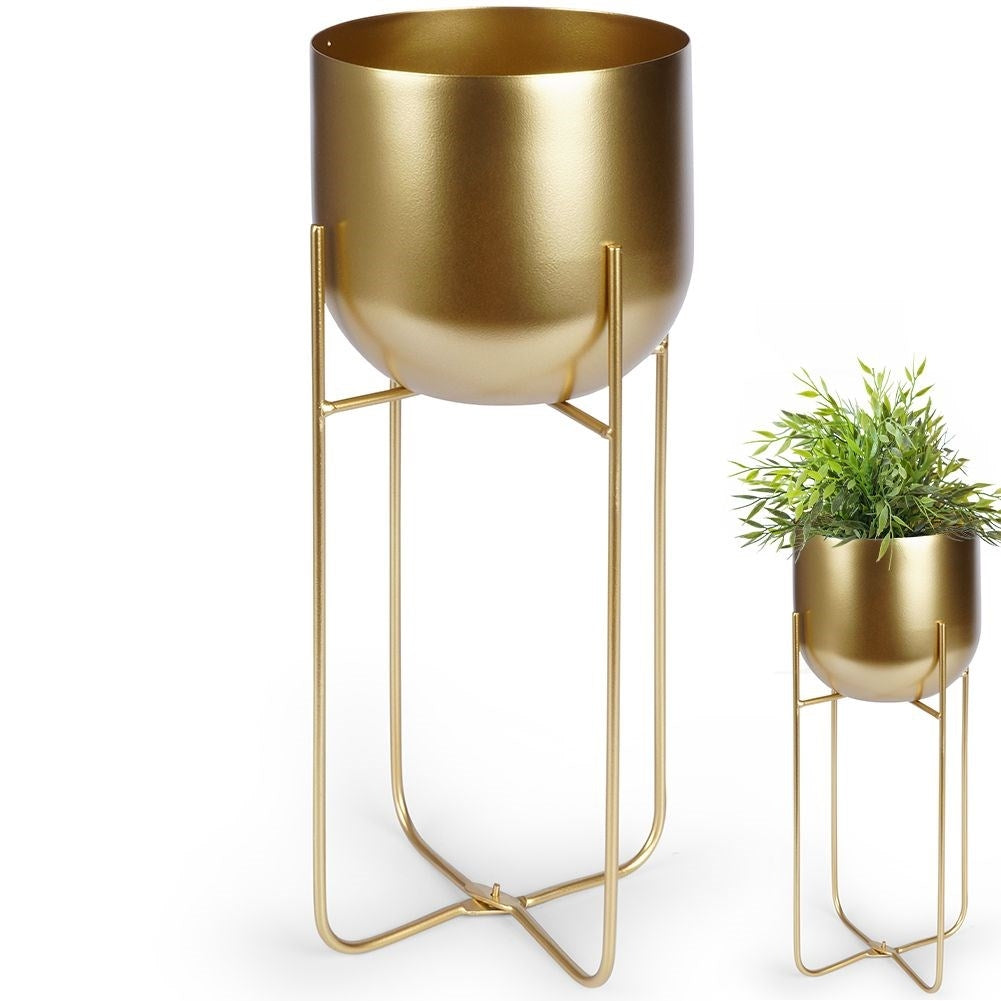 Gold colored metal pot on stand - modern and glamorous