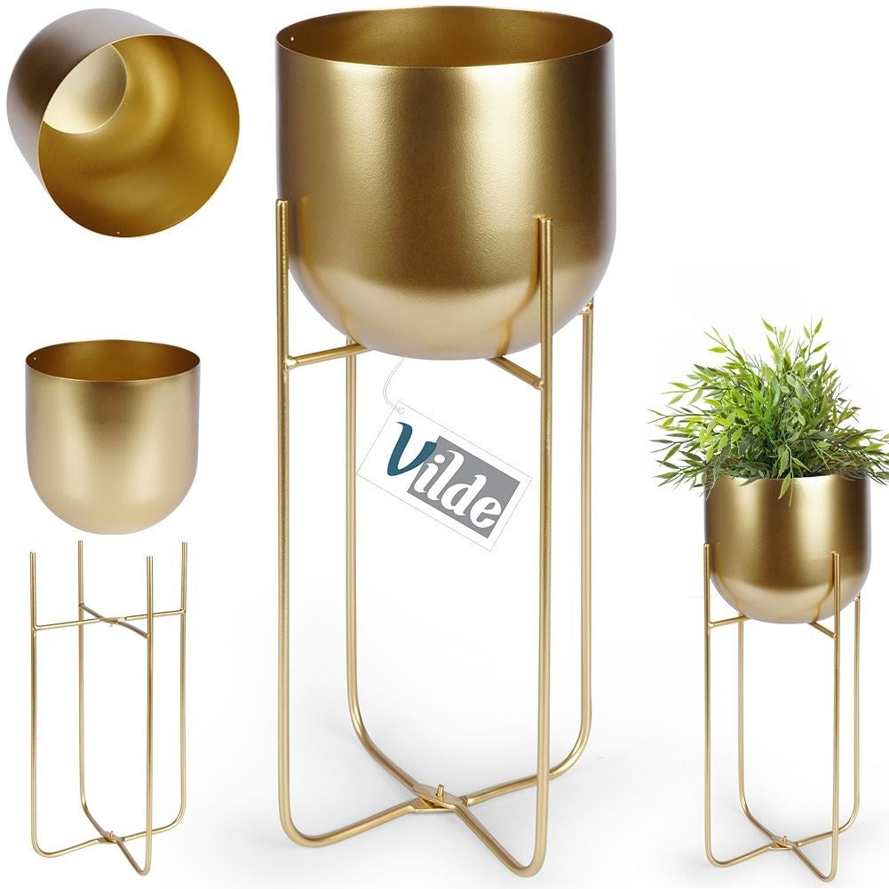 Gold colored metal pot on stand - modern and glamorous