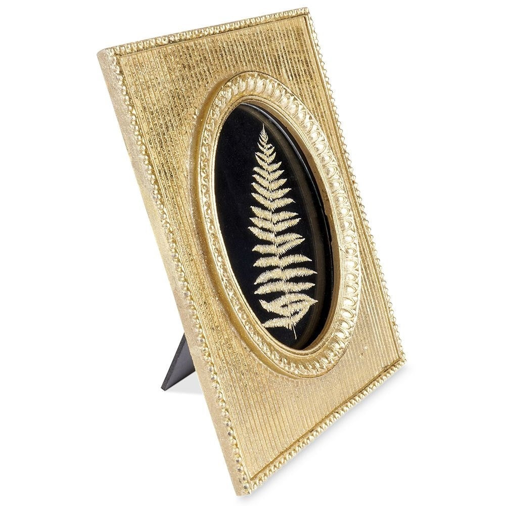 Gold-colored photo frame 10x15 cm in synthetic stone