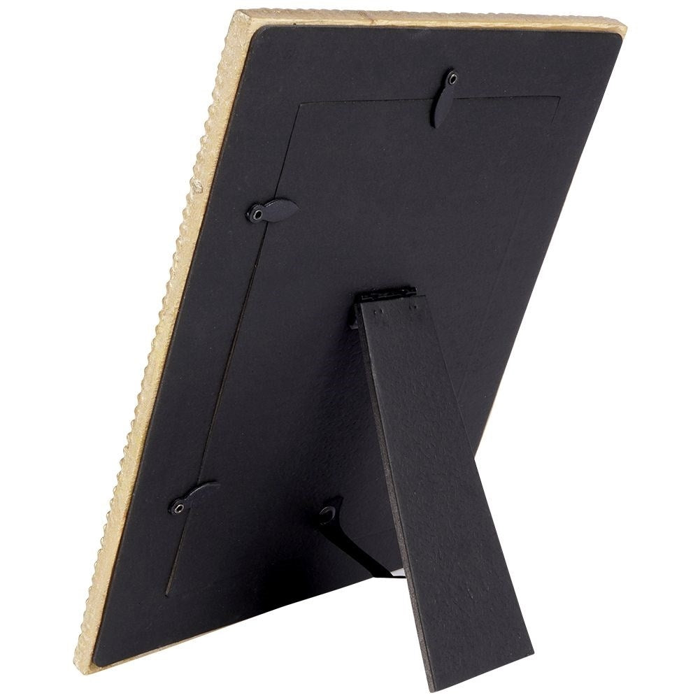 Gold-colored photo frame 10x15 cm in synthetic stone