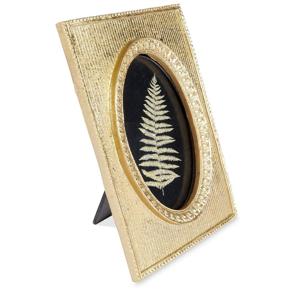 Gold-colored photo frame for 10x15 cm pictures