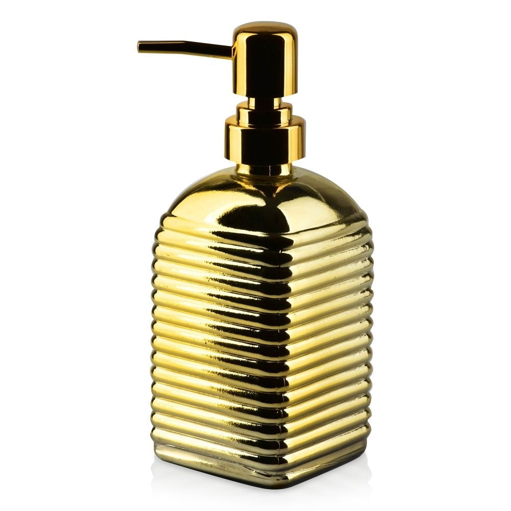 Gold colored soap pump in glass for kitchen and bathroom