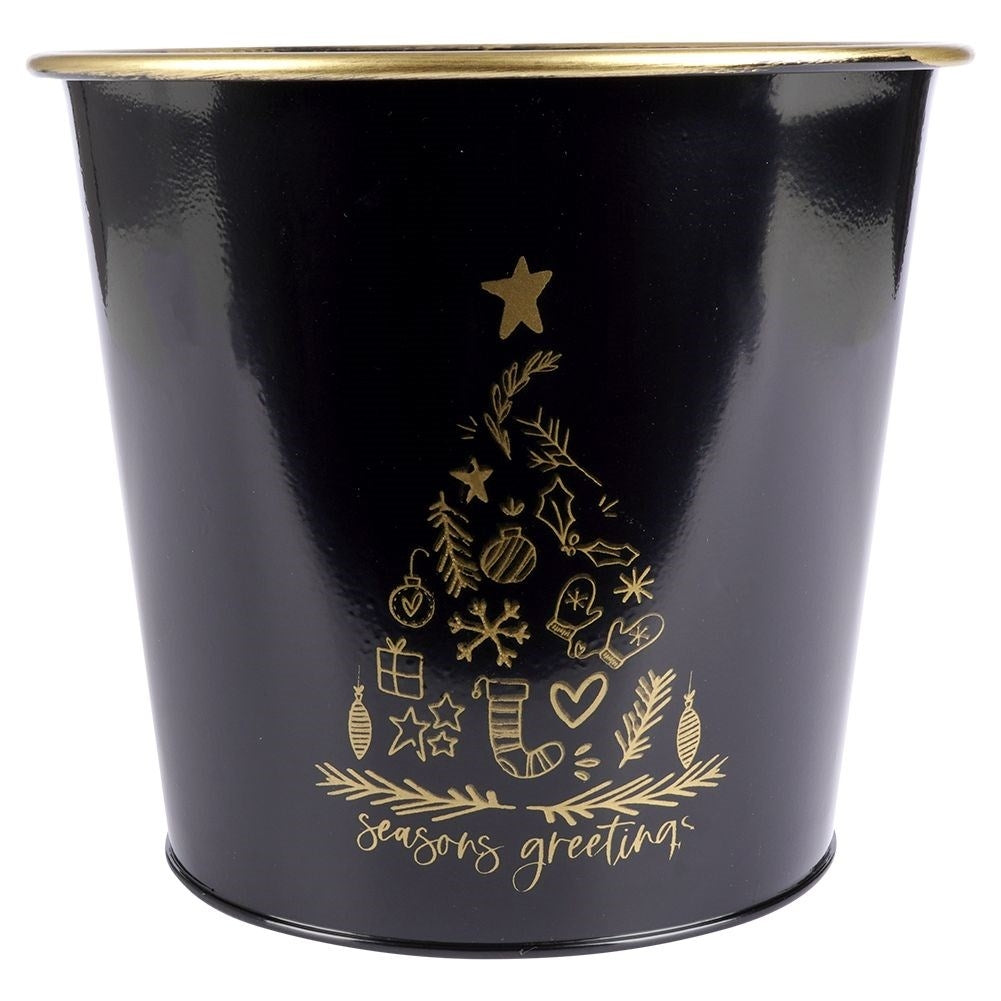 Golden metal Christmas pot with white decorative Christmas tree