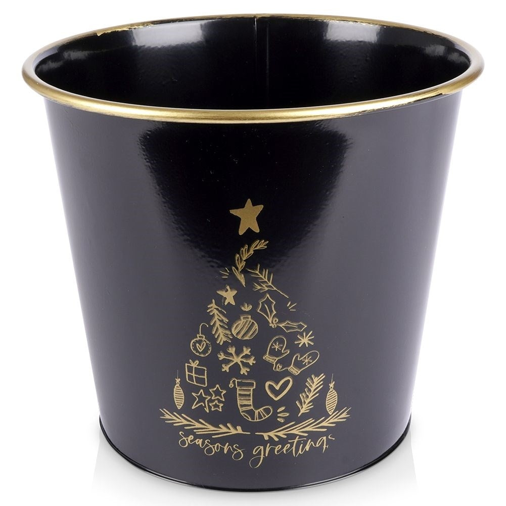 Golden metal Christmas pot with white decorative Christmas tree
