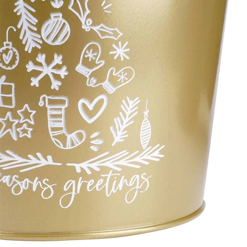 Gold metal pot with white Christmas tree decoration for plants