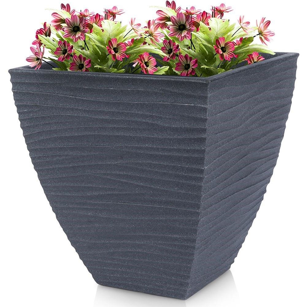 Graphite-colored flower pot in weather-resistant material for the garden