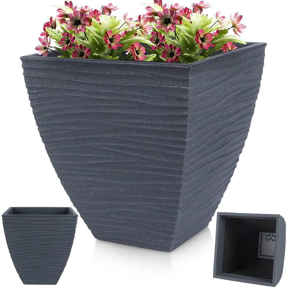 Graphite-colored flower pot in weather-resistant material for the garden