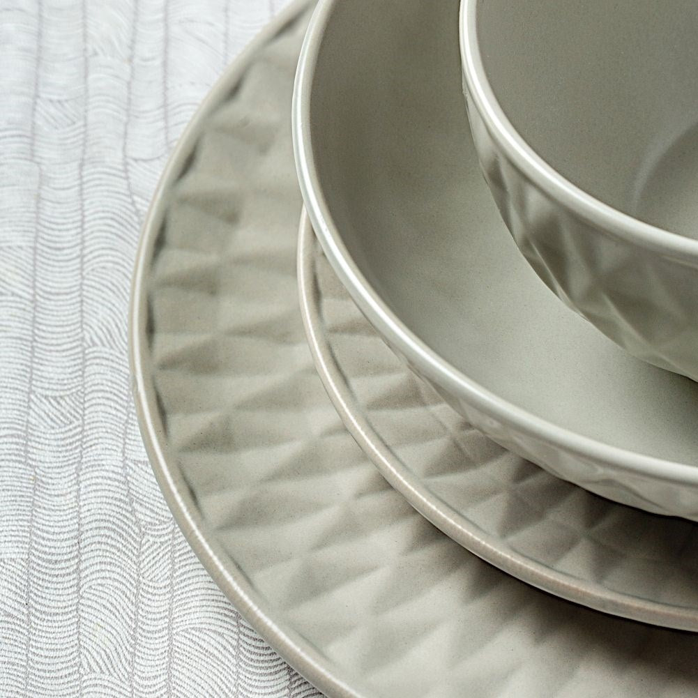 Gray ceramic dessert plate with impressive embossing