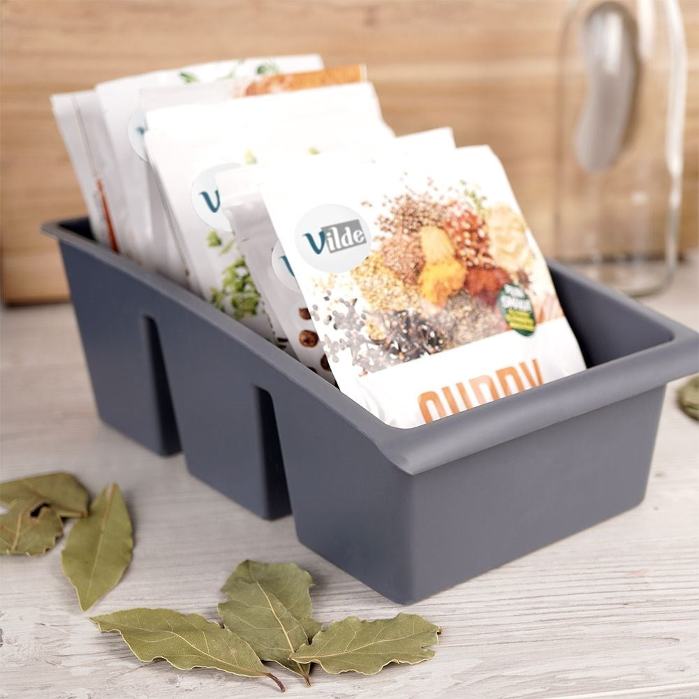 Gray storage box for plastic spice bags