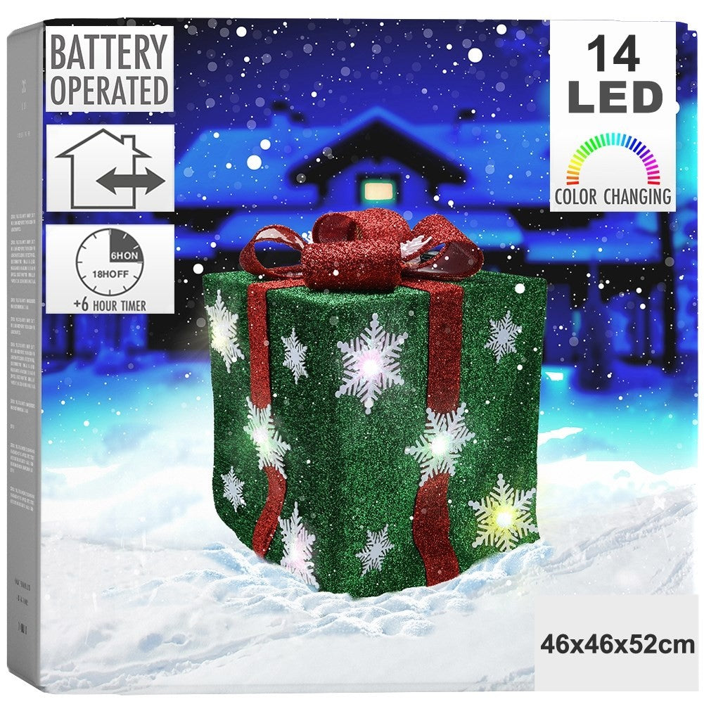 Green Christmas gift with red bow, white snowflakes and LED lights