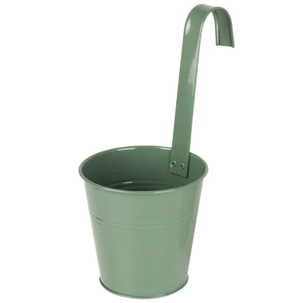 Green metal pot with handle for balcony or terrace