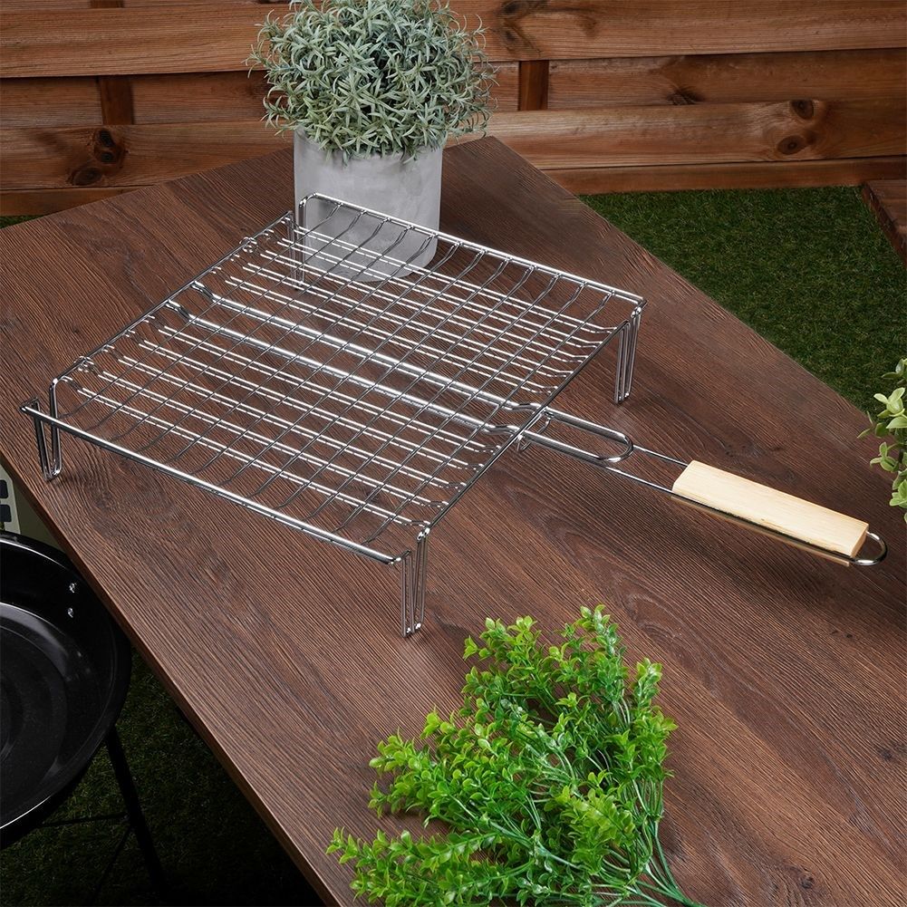 Grill grate with legs and wooden handle for easy grilling