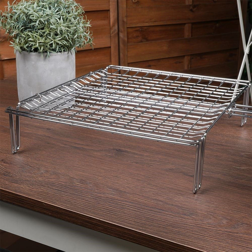 Grill grate with legs and wooden handle for easy grilling