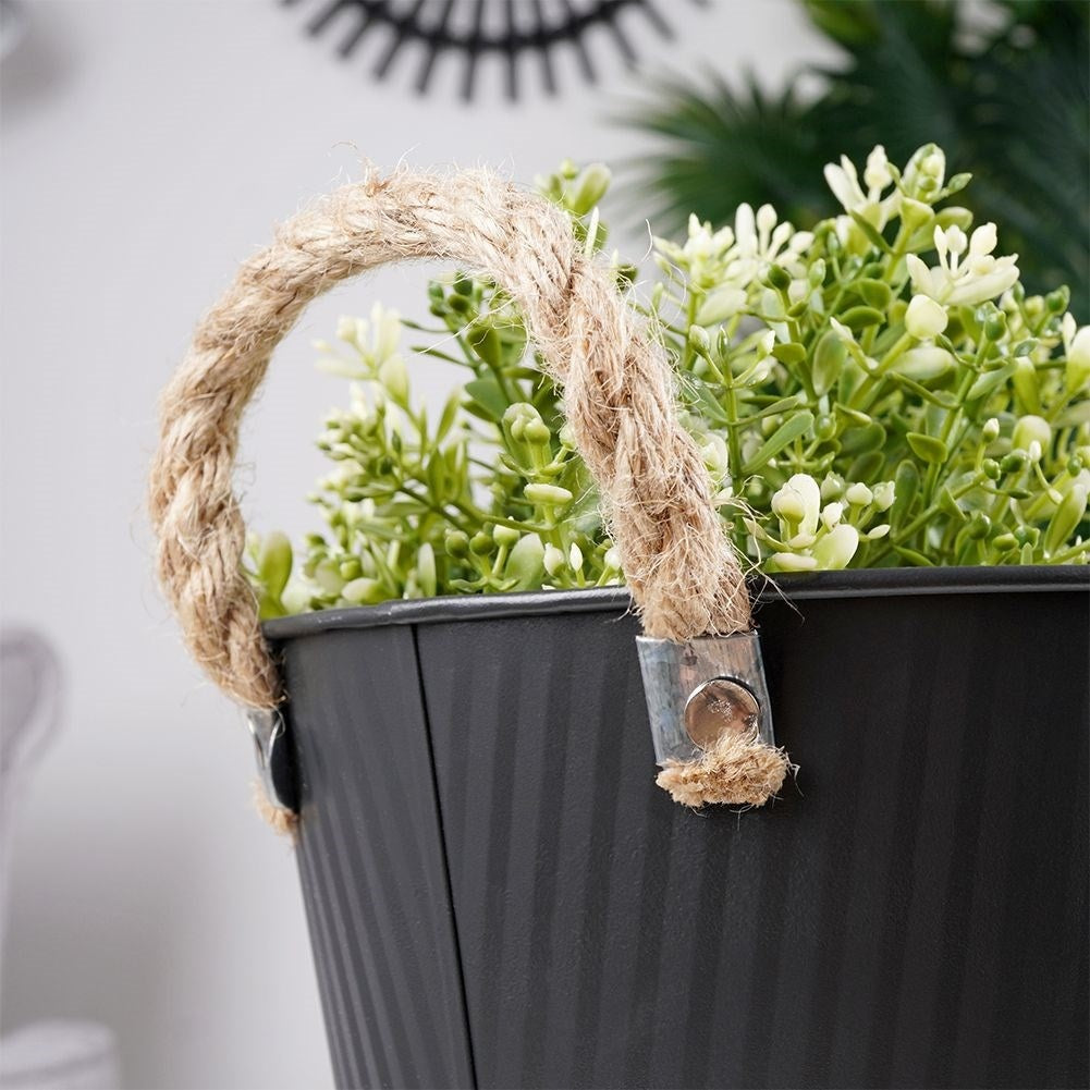 Grooved pot cover in black galvanized metal