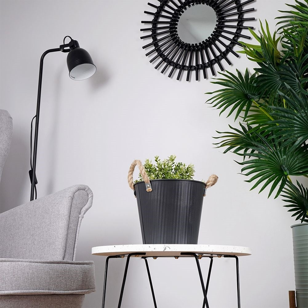 Grooved pot cover in black galvanized metal