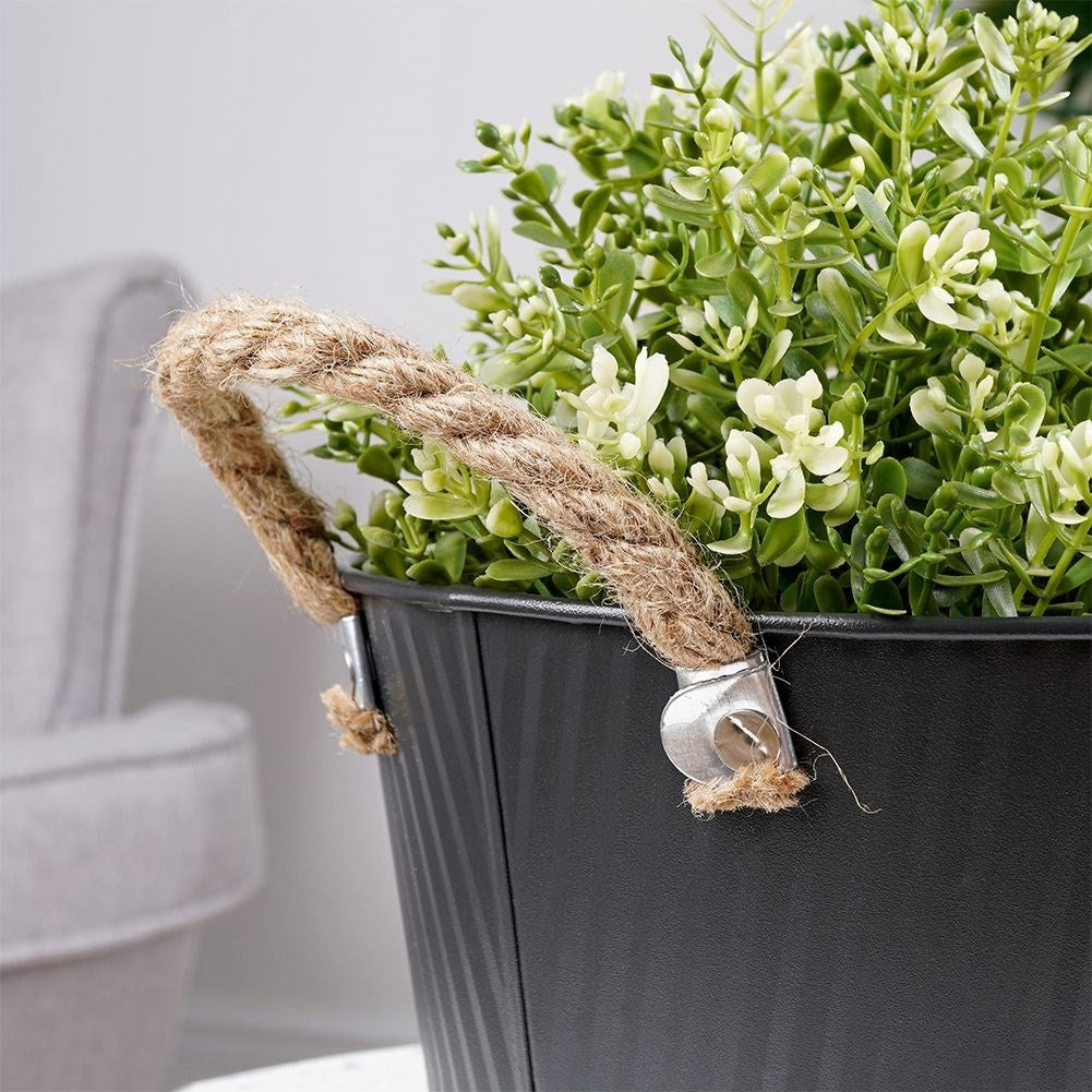 Grooved pot cover in black galvanized metal for indoor/outdoor use