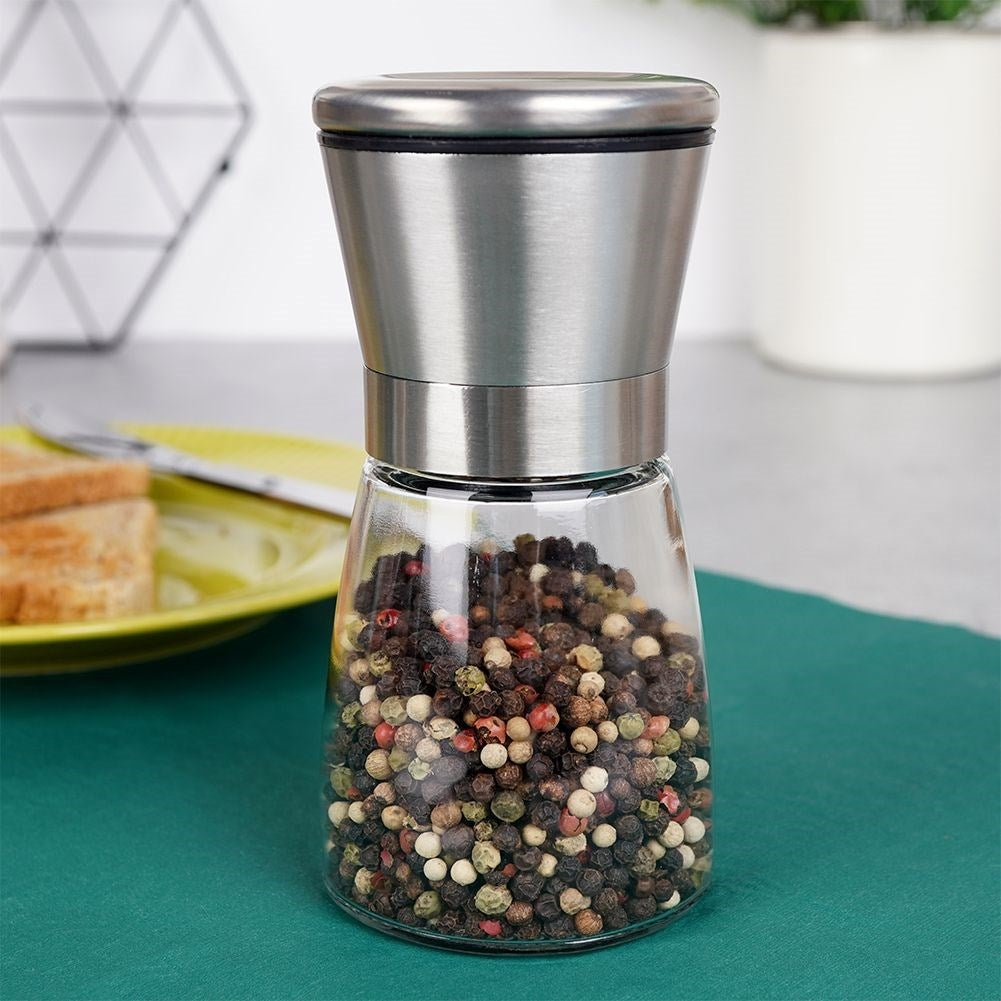 Hand grinder with adjustable grinding degree and ceramic grinder
