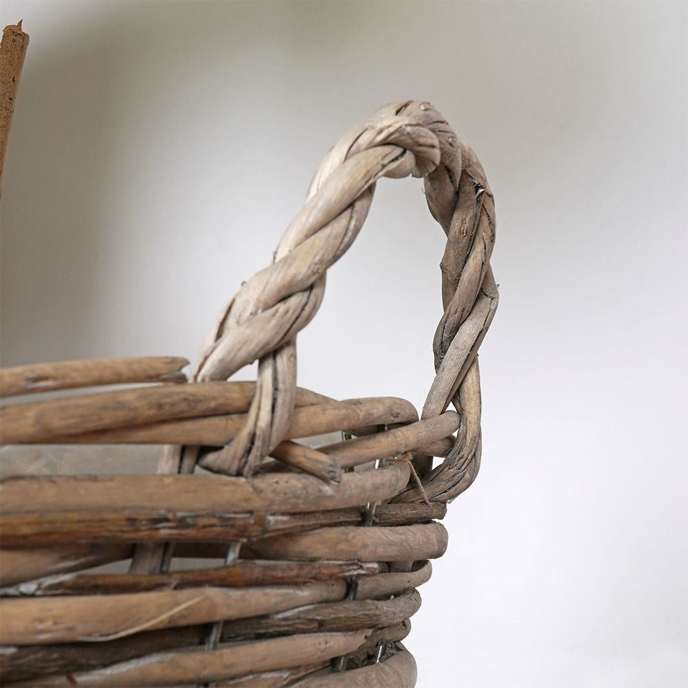Handmade plant pot in braided willow with plastic film inside