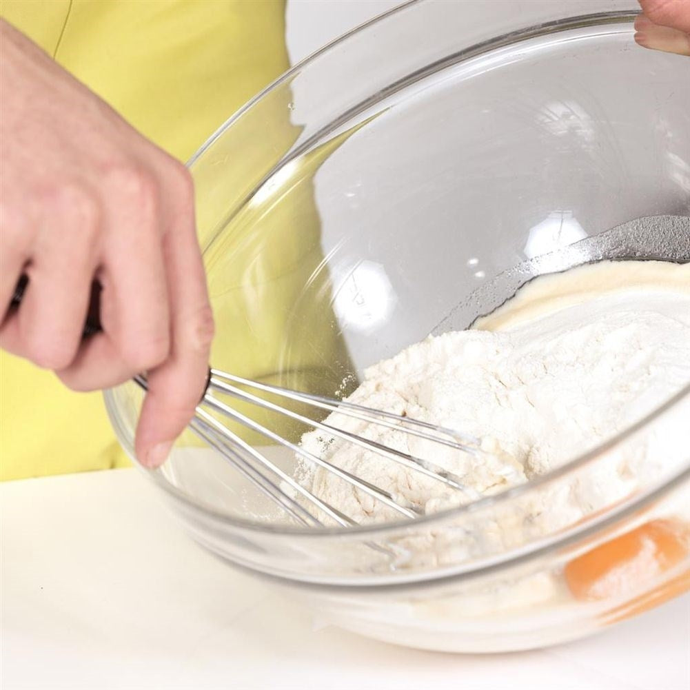 Hand whisk with extra ball in stainless steel for faster whisking