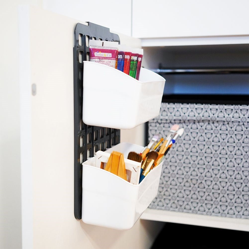 Hanging basket for cabinet and shower with two compartments